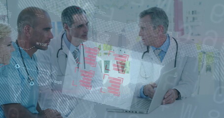 Meeting medical team discussing patient data in clinic nook, with laptop world map overlay