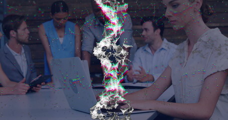 Woman in blouse typing on laptop with colleagues at conference table, network overlay, copy space