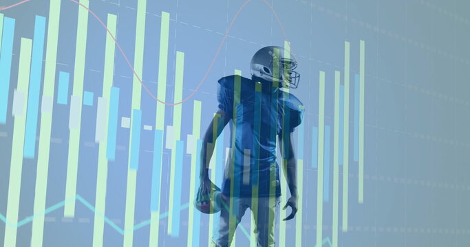 Standing helmeted player in jersey holding football in analytics hub, with bar and line graphs - Powered by Adobe
