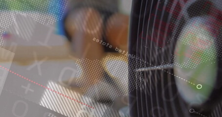 Kneeling adult male exercising on wood gym floor, with fan grill, athletic shoes, digital overlay