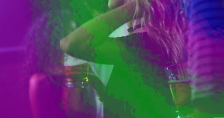 Blonde-haired woman standing at nightclub bar holding pint glass under neon lights, copy space