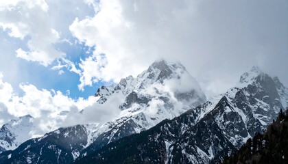 Fototapeta premium Snowy peak, cloudy weather