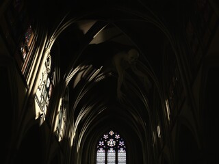 Gothic Cathedral Interior at Dusk - Narrow Aisle and High Arched Vaults
