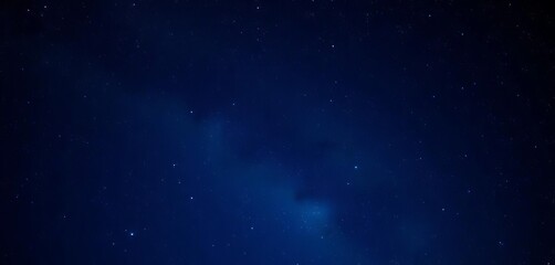 Naklejka premium Deep, inky blue night sky brimming with realistically rendered stars and subtle nebulae, night, night sky vector