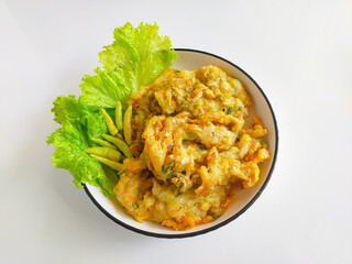 
Bakwan sayur or bala-bala or vegetable fritter, Indonesian snack made from flour, cabbage, carrots and bean sprouts, served with chili