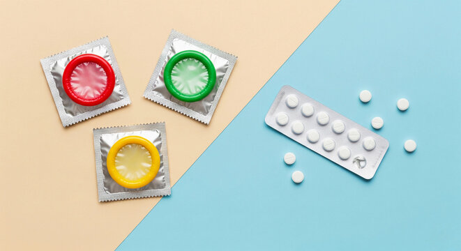 http://googleusercontent.com/image_generation_content/1


Condoms and birth control pills on a split background. Represents contraception methods, safe sex, family planning, and women's health choices