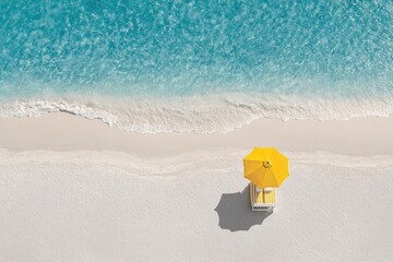 Naklejka premium Aerial View Of Tropical Beach With Yellow Umbrella And Chair