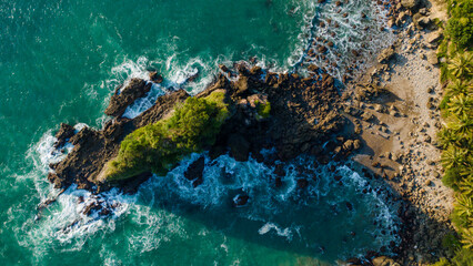 Aerial Photo of Karang Agung Rocky Beach at Sunset, Beautiful Coastal Texture from Above, UNESCO Global Geopark Kebumen