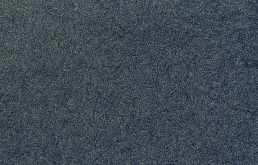 Dark gray rough textured paper background