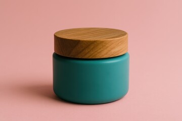 Teal Cream Jar with Wooden Lid on Pink Background