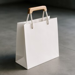 White Shopping Bag with Wooden Handles on Grey Floor