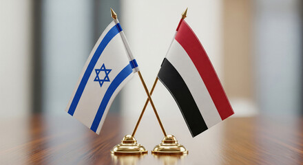 Israel And Yemen Miniature Table Flags Crossed On Diplomatic Conference Desk With Fabric Texture And Neutral Blur Background JPG