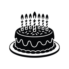 Black and white birthday cake with lit candles