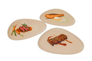 Culinary Trio of Elegance: A delectable ensemble features three distinct dishes: grilled salmon, tender steak with vibrant vegetables, and succulent ribs, each exquisitely presented on elegant plates.