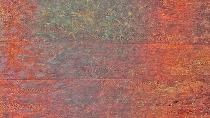 Old wooden board texture with rough surface scratches. Distressed brown wood background with...