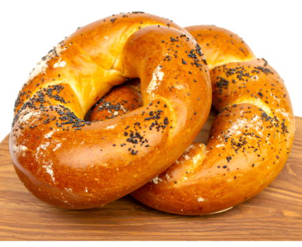 Two everything bagels isolated on transparent background