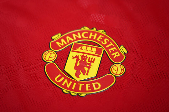 CHIANG MAI ,THAILAND - August 26, 2025 : New home Shirt English football club Manchester United emblem on jersey.