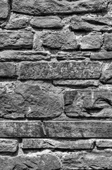 Stone wall background in black and white close up view