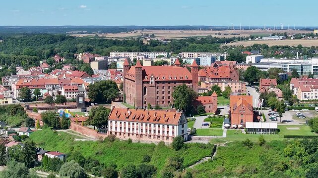 Aerial Gniew Poland historic village and castle pull 2. Northern Poland. Castle construction 13th century by Teutonic Knights. Vistula River. Agriculture land, river, forest and farm rural area.