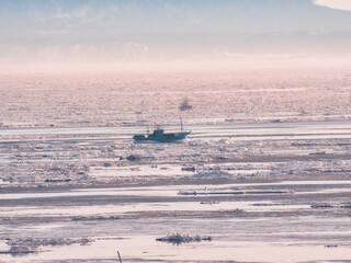 Hokkaido, Japan - February 19, 2024:  Drift ice at Nemuro strait in Hokkaido, Japan © Khun Ta