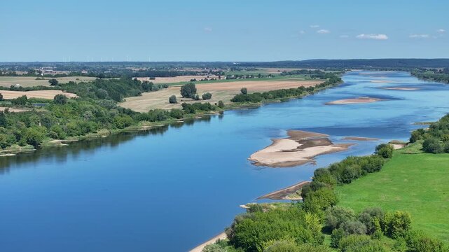 Aerial Gniew Poland Vistula River slide. Northern Poland. Castle construction 13th century by Teutonic Knights. Vistula River. Agriculture land, river, forest and farm rural area.