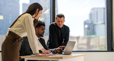 Diverse business team brainstorming together, strategic planning with tablet in office, inclusive workplace, financial strategy, b2b startup innovation, teamwork seminar and corporate collaboration © Art_Photo
