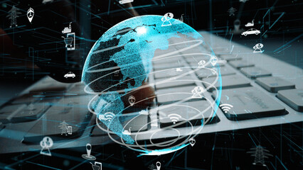A visually striking digital globe surrounded by technology icons, displayed over a laptop keyboard, showcases the essence of innovation in global connectivity and communication. Xenic