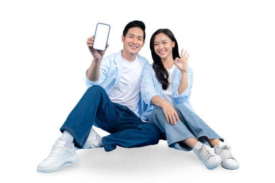 A happy couple showcasing a smartphone with a blank screen on PNG background