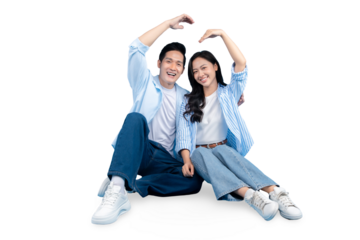 A lovely couple sitting with their hands forming a house shape on PNG background