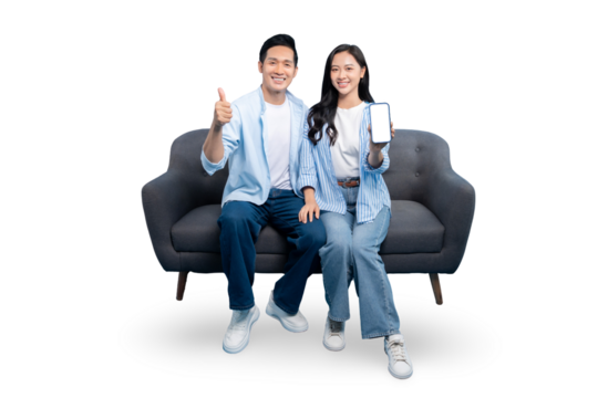 A couple showcasing a smartphone on a sofa on a transparent background
