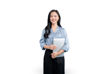 A stylish businesswoman holding a laptop, posing with a radiant smile