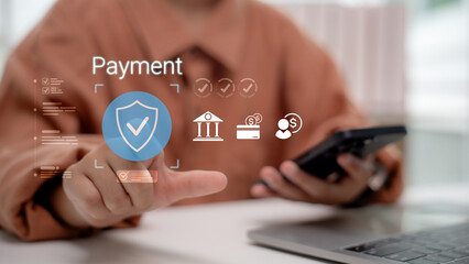 Close up of hand using smartphone with secure online payment interface. Concept of mobile banking, fintech, cyber security, digital transaction, and safe financial technology for e-commerce.