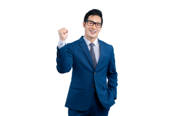  Asian businessman  professional in a blue suit with a determined expression. He is clenching his fist in a symbol of triumph on PNG background