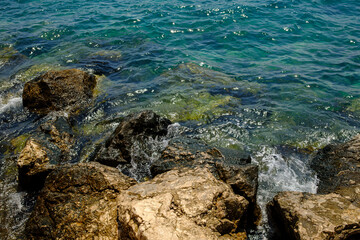 ocean waves crashing on rocks