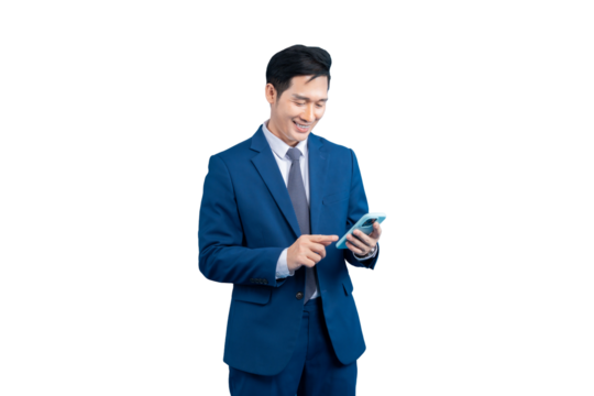  Asian businessman  engrossed in his phone, showcasing professionalism. He is smiling wearing a blue suit on PNG background