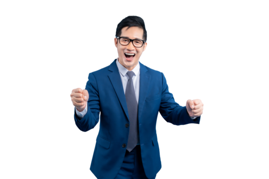  Asian businessman  in a suit with glasses shows his joy. He is clenching his fists and making a victory pose on PNG background