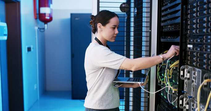 Woman, laptop and cable inspection in server room, coding and checklist for IT solution at company. Person, cybersecurity and assessment with computer, hardware and information technology at agency - Powered by Adobe