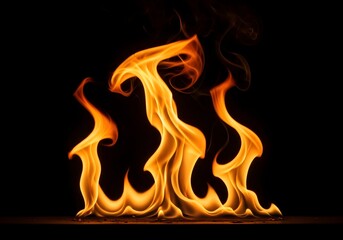 Fototapeta premium Dynamic flames burning with vibrant orange and yellow colors against a dark background