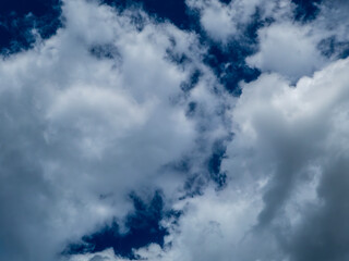 Dramatic Sky with Fluffy White Clouds.