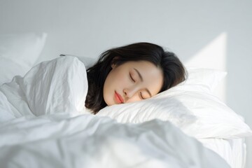 ふかふかの布団で眠る女性