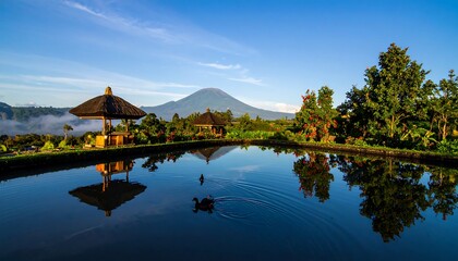 Obraz premium Serene Infinity Pool Overlooking Mountain Landscape at Sunrise.