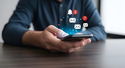 Man holding smartphone with email notifications