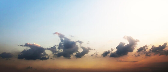 Dramatic atmosphere panoramic aerial view of twilight sky and beautiful form of clouds in summer. Image use for meteorology forecast and environmental presentation background.