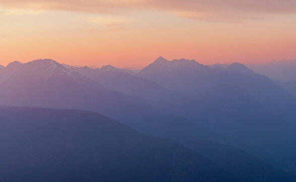 Alpenglow on far off mountain range