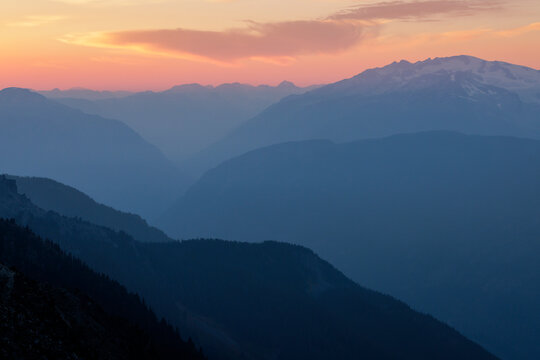 Alpenglow on far off mountain range