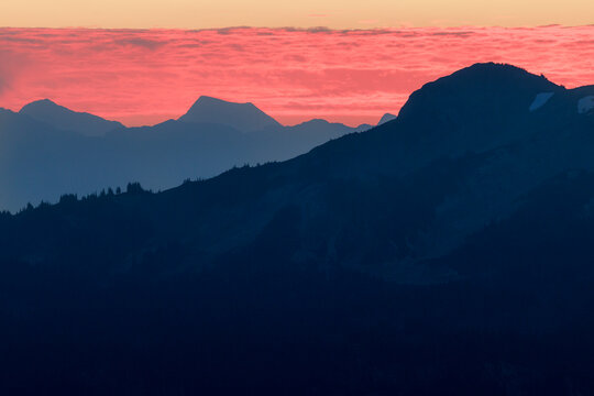 Tranquil scene of mountain range filled with sunrise.