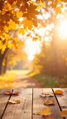Golden autumn leaves on wooden table with sunlight, capturing the essence of fall season. A warm and inviting fall image