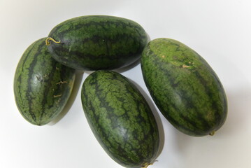 fresh cucumbers on a wooden table