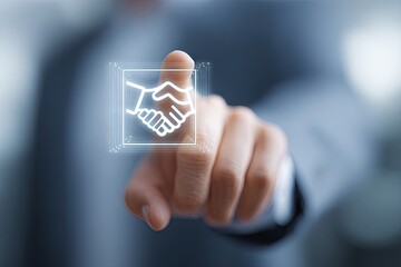 A person's fingertip hovers over a glowing digital handshake icon