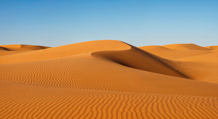 Golden Sands: Captivating the vast, undulating beauty of a desert landscape under a clear, azure sky. Revealing the timeless allure of this awe-inspiring environment.